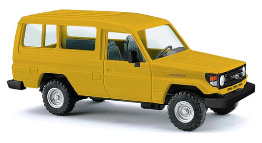 Busch 43554 - Toyota Land Cruiser HZJ 78, gel 1:87